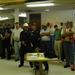 Emergency personnel meet in a building to discuss the best course of action.